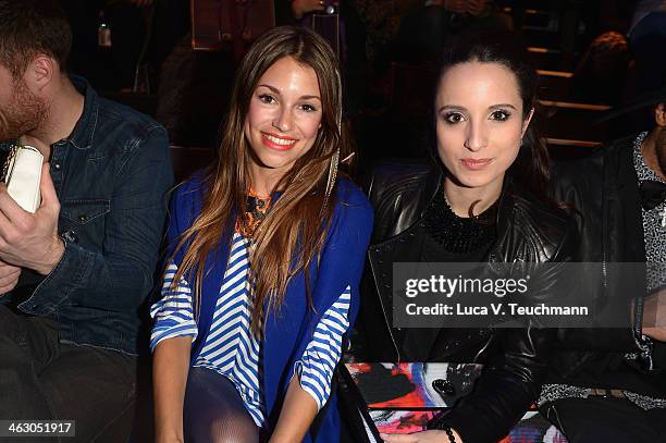 Anna Julia Kapfelsberger and Stephanie Stumph attend the Laurel show during Mercedes-Benz Fashion Week Autumn/Winter 2014/15 at Brandenburg Gate on...