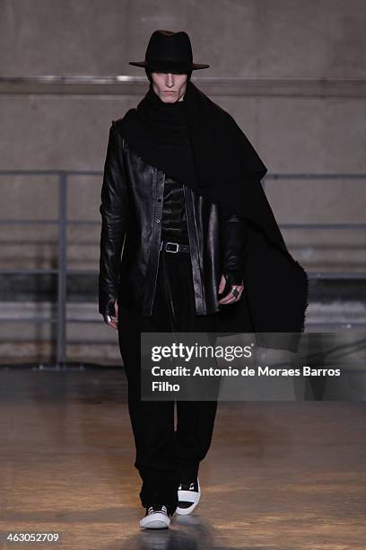 Model walks the runway during the Boris Bidjan Saberi Menswear Fall/Winter 2014-2015 show as part of Paris Fashion Week on January 16, 2014 in Paris,...