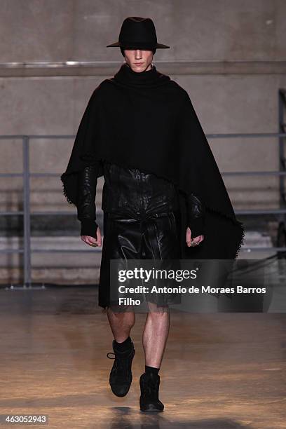 Model walks the runway during the Boris Bidjan Saberi Menswear Fall/Winter 2014-2015 show as part of Paris Fashion Week on January 16, 2014 in Paris,...