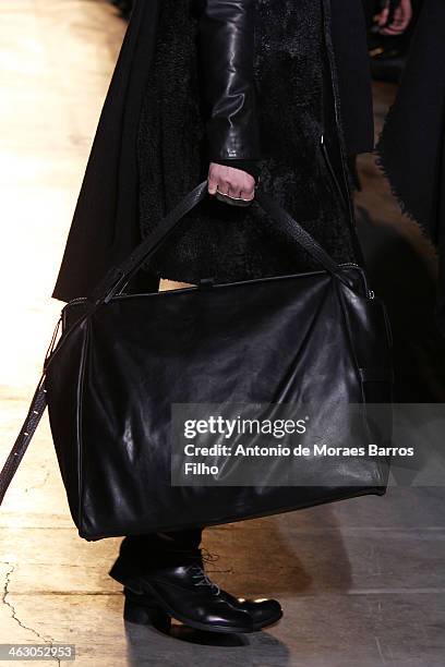 Model walks the runway during the Boris Bidjan Saberi Menswear Fall/Winter 2014-2015 show as part of Paris Fashion Week on January 16, 2014 in Paris,...