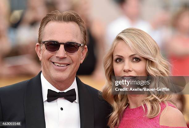 Actor Kevin Costner and wife Christine Baumgartner arrive at the 21st Annual Screen Actors Guild Awards at The Shrine Auditorium on January 25, 2015...