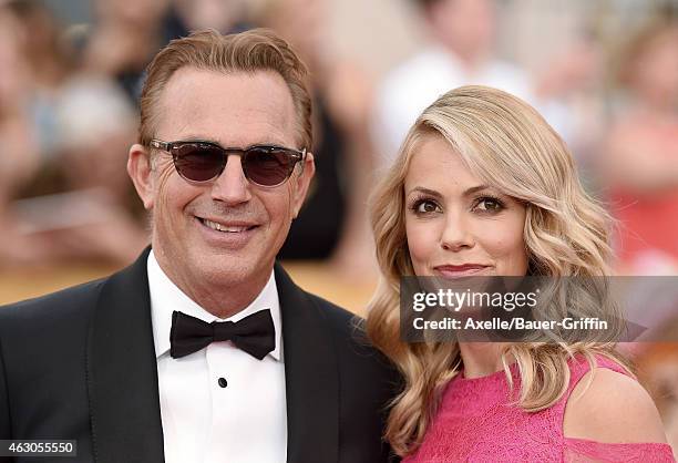 Actor Kevin Costner and wife Christine Baumgartner arrive at the 21st Annual Screen Actors Guild Awards at The Shrine Auditorium on January 25, 2015...
