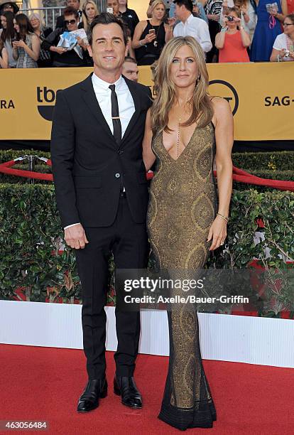 Actors Justin Theroux and Jennifer Aniston arrive at the 21st Annual Screen Actors Guild Awards at The Shrine Auditorium on January 25, 2015 in Los...