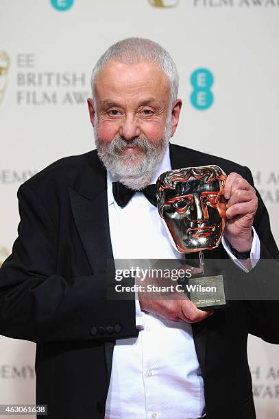 Mike Leigh, winner of the BAFTA Fellowshipposes in the winners room at the EE British Academy Film Awards at The Royal Opera House on February 8,...