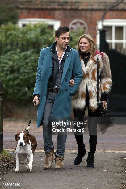 Kate Moss and husband Jamie Hince are pictured taking an early evening stroll with their dog in a London Park on February 7, 2015 in London, England.
