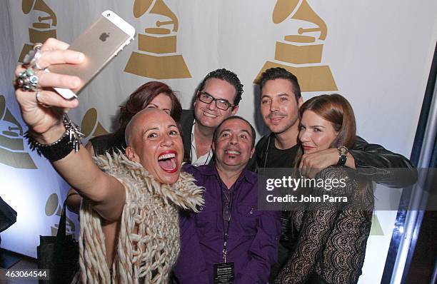 Jorge Moreno and guest attend the 57th Annual GRAMMY Awards Telecast Viewing Party at Cinepolis Grove 13 Theaters on February 8, 2015 in Coconut...