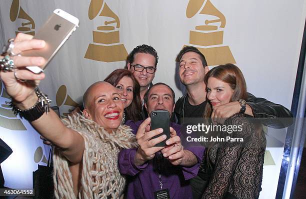 Jorge Moreno and guest attend the 57th Annual GRAMMY Awards Telecast Viewing Party at Cinepolis Grove 13 Theaters on February 8, 2015 in Coconut...