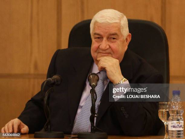 Syrian Deputy Prime Minister, Foreign and Expatriates Minister Walid Muallem looks on during a news conference with Minister of Foreign Affairs of...