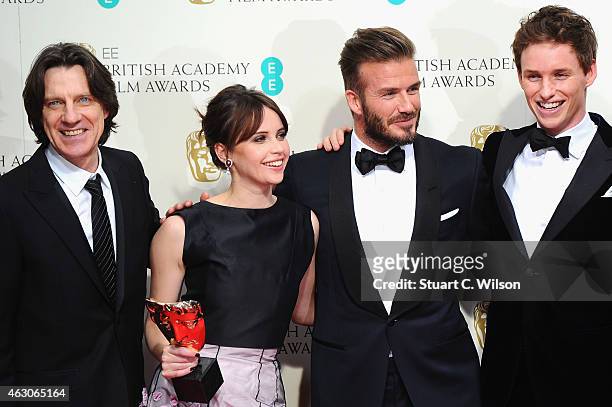 James Marsh, Felicity Jones, David Beckham and Eddie Redmayne celebrate Outstanding British Film winner 'The Theory Of Everything' in the winners...
