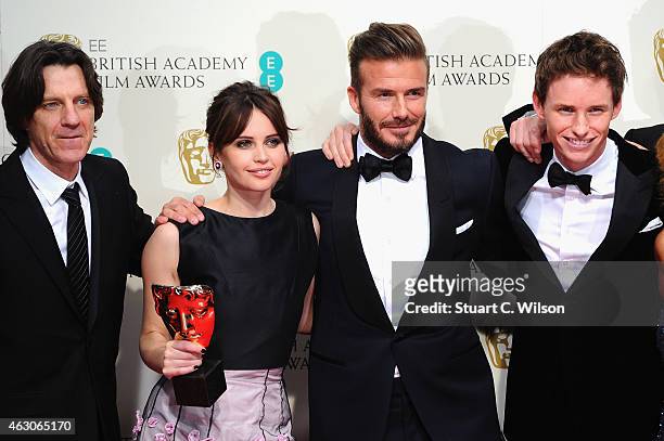 James Marsh, Felicity Jones, David Beckham and Eddie Redmayne celebrate Outstanding British Film winner 'The Theory Of Everything' in the winners...