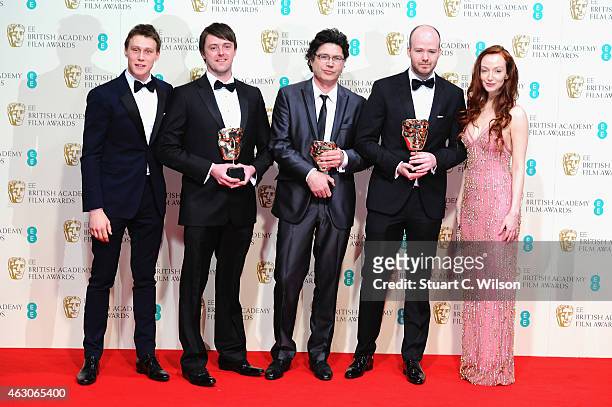 George MacKay and Olivia Grant pose with Michael Lennox, Ronan Blaney and Brian J. Falconer, winners of the Best Short Film award for 'Boogaloo and...