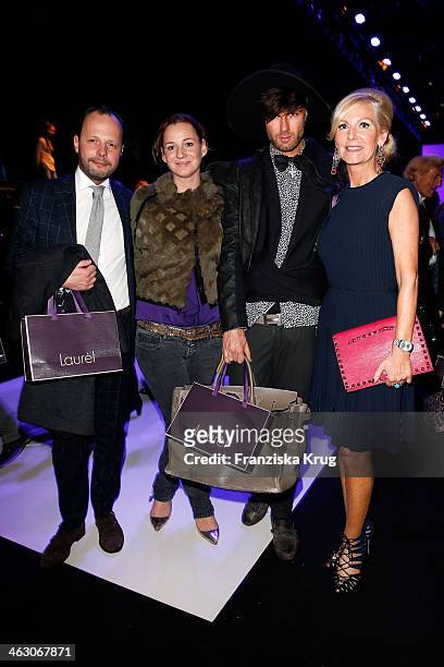 Andre Borchers and Marion Fedder attend the Laurel show during Mercedes-Benz Fashion Week Autumn/Winter 2014/15 at Brandenburg Gate on January 16,...