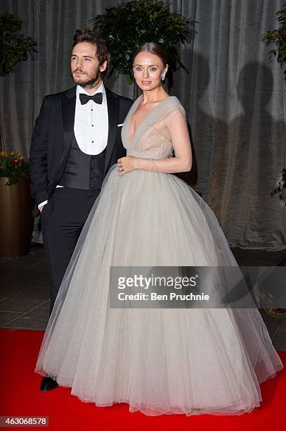 Sam Claflin and Laura Haddock attend the after party for the EE British Academy Film Awards at The Grosvenor House Hotel on February 8, 2015 in...