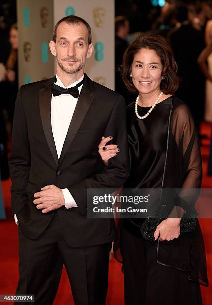Anthony Stacchi and guest attend the EE British Academy Film Awards at The Royal Opera House on February 8, 2015 in London, England.
