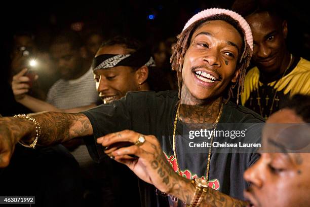 Rappers Ty Dolla $ign and Wiz Khalifa attend Wiz Khalifa's post-Grammy party at Project La on February 8, 2015 in Los Angeles, California.