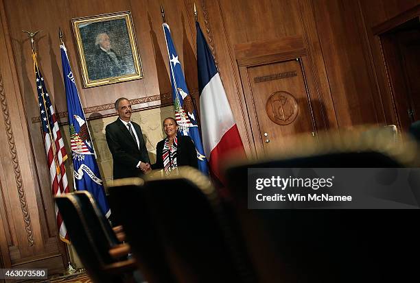 Attorney General Eric Holder meets with French Minister of Justice Christiane Taubira at the Justice Department February 9, 2015 in Washington, DC....