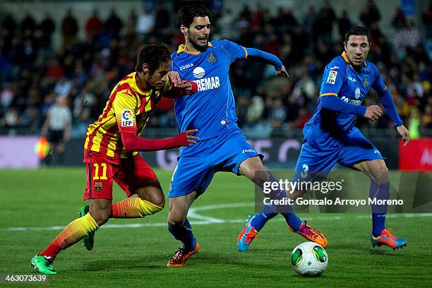 Neymar Jr. Of FC Barcelona competes for the ball with Angel Lafita of Getafe CF during the Copa del Rey Round of 8 second leg match between Getafe CF...