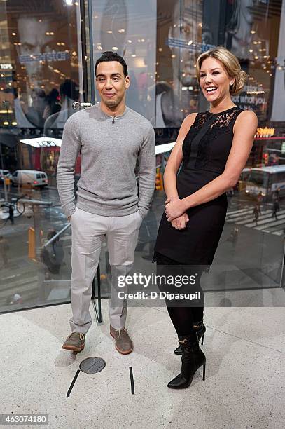 Charissa Thompson interviews Victor Rasuk during his visit to "Extra" at their New York studios at H&M in Times Square on February 9, 2015 in New...