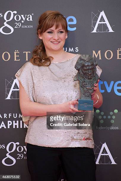 Patricia Font holds the award for Best Short Film Live Action in the film 'Cafe para llevar' during the 2015 edition of the 'Goya Cinema Awards' at...
