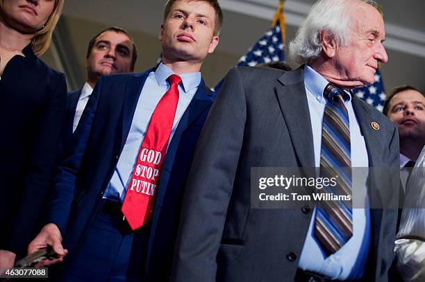 Member of the Alex Goncharenko, a member of the Ukrainian Parliament wears an anti Vladimir Putin tie during a news conference with Reps. Sander...