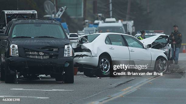 Sheriff's investigators work an accident scene on PCH where one person was killed and at least seven other people were injured in a four-vehicle...