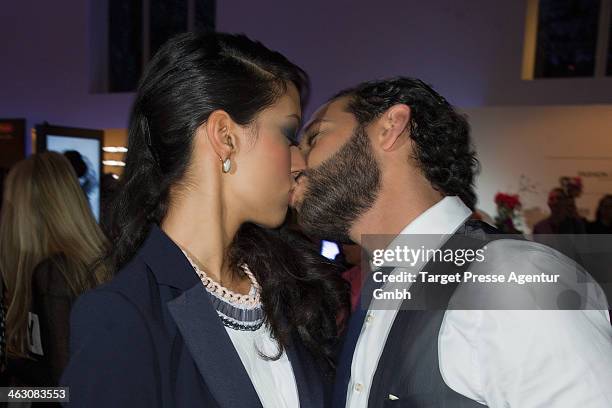 Rebecca Mir and Massimo Sinato arrive the Marc Cain show during Mercedes-Benz Fashion Week Autumn/Winter 2014/15 at Brandenburg Gate on January 16,...