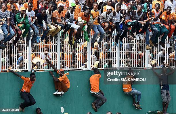 Ivorians attend a welcoming ceremony at Felix Houphouet Boigny Stadium to greet their national football team in Abidjan on February 9 a day after...