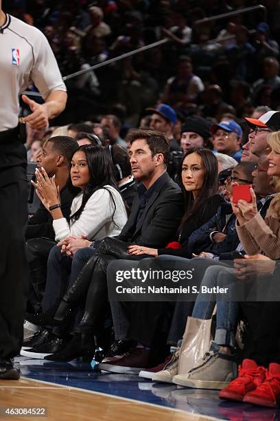 Dylan McDermott and Maggie Q attend the Golden State Warriors game against the New York Knicks on February 7, 2015 at Madison Square Garden in New...
