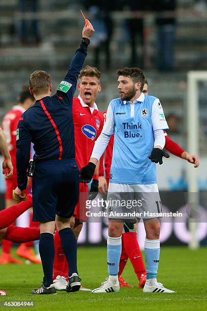 Ilie Sanchez of 1860 Muenchen receives the Red card from referee Patrick Ittrich during the Second Bundesliga match between 1860 Muenchen and 1. FC...