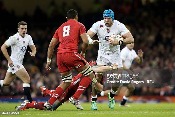James Haskell of England is challenged by Toby Faletau of Wales during the RBS Six Nations match between Wales and England at the Millennium Stadium...
