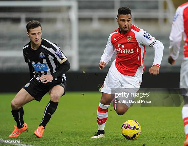 Serge Gnabry of Arsenal turns away from Jamie Sterry of Newcastle during the match between Newcastle United and Arsenal in the Barclays U21 Premier...