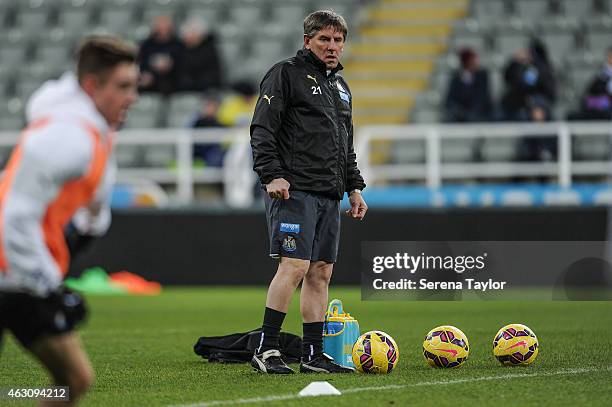 Newcastles' football development manager Peter Beardsley stands on the pitch with footballs during the U21 Barclays Premier League match between...