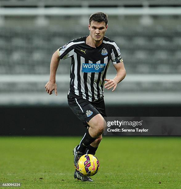 Curtis Good of Newcastle runs with the ball during the U21 Barclays Premier League match between Newcastle United and Arsenal at St. James' Park on...