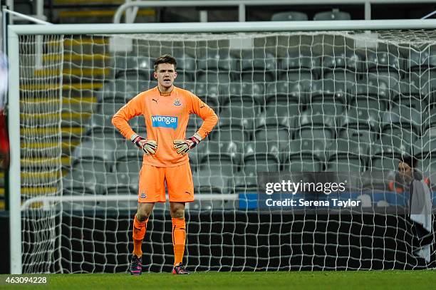 Newcastle goalkeeper Freddie Woodman stands in the goal during the U21 Barclays Premier League match between Newcastle United and Arsenal at St....