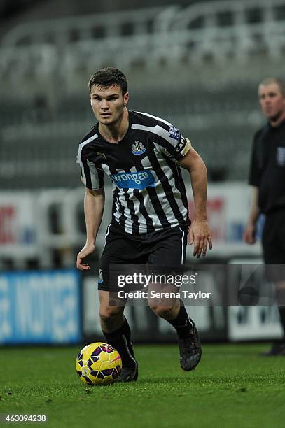 Curtis Good of Newcastle runs with the ball during the U21 Barclays Premier League match between Newcastle United and Arsenal at St. James' Park on...