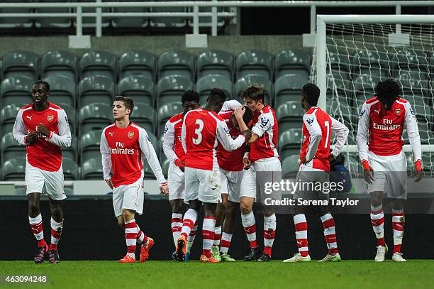 Arsenal players celebrate after Alex Iwobi scores the opening goal during the U21 Barclays Premier League match between Newcastle United and Arsenal...