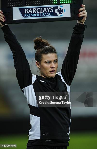 Fourth official Lucy May holds a barclays sign during the U21 Barclays Premier League match between Newcastle United and Arsenal at St. James' Park...