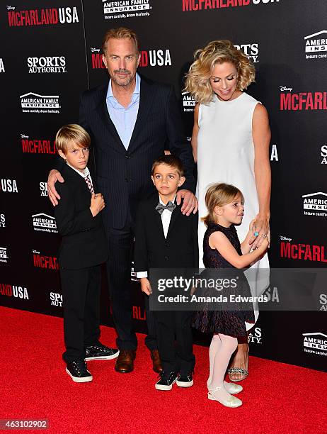 Actor Kevin Costner, his wife Christine Baumgartner and their children arrive at the world premiere of Disney's "McFarland, USA" at the El Capitan...