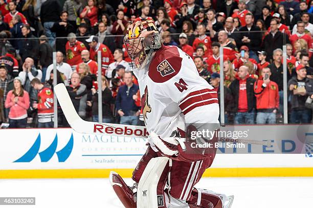 Goalie Mike Smith of the Arizona Coyotes reacts after the Coyotes defeated the Chicago Blackhawks 3-2 during the NHL game at the United Center on...