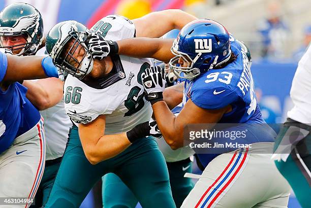 Mike Patterson of the New York Giants in action against Andrew Gardner of the Philadelphia Eagles on December 28, 2014 at MetLife Stadium in East...