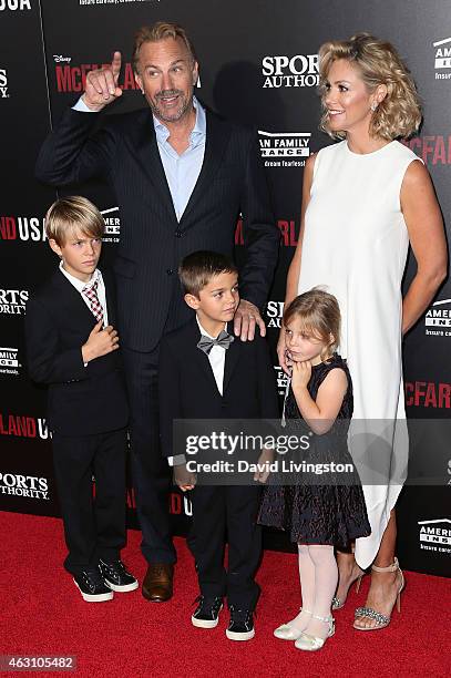 Actor Kevin Costner, wife Christine Baumgartner and children attend the premiere of Disney's "McFarland, USA" at the El Capitan Theatre on February...