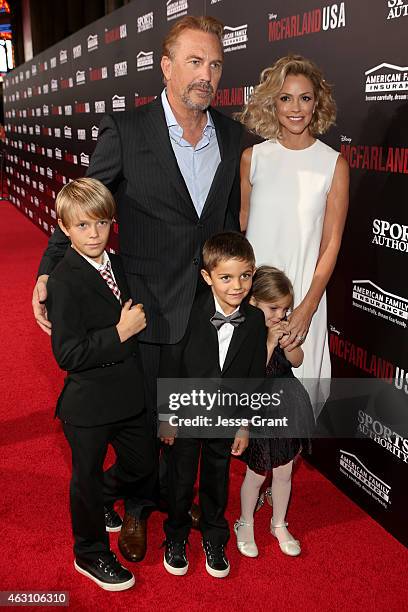 Actor Kevin Costner and Christine Baumgartner with their children attend the world premiere of "McFarland, USA" at The El Capitan Theatre on February...