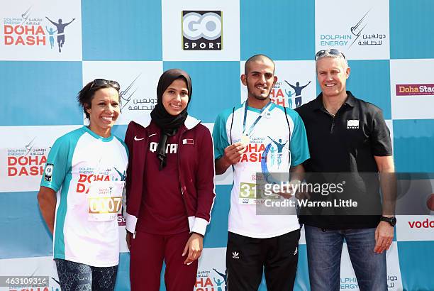 Dame Kelly Holmes of Great Britain, Mariam Farid of Qatar, Ali Mohammed of Yeman and Andrew Fairall, General Manager of Go Sport at the prize giving...