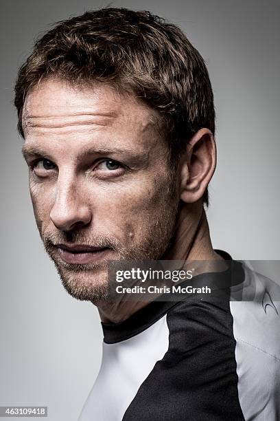 McLaren-Honda driver Jenson Button poses for photographs in a portrait session at the Honda Motor Co. Headquarters on February 10, 2015 in Tokyo,...