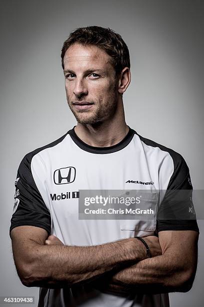 McLaren-Honda driver Jenson Button poses for photographs in a portrait session at the Honda Motor Co. Headquarters on February 10, 2015 in Tokyo,...