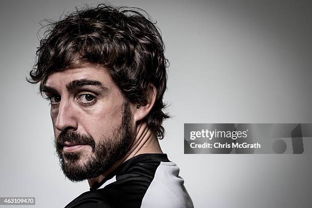 McLaren-Honda driver Fernando Alonso poses for photographs in a portrait session at the Honda Motor Co. Headquarters on February 10, 2015 in Tokyo,...