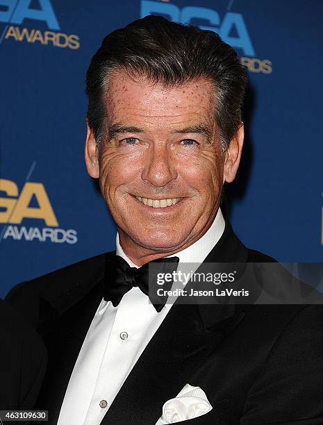 Actor Pierce Brosnan poses in the press room at the 67th annual Directors Guild of America Awards at the Hyatt Regency Century Plaza on February 7,...