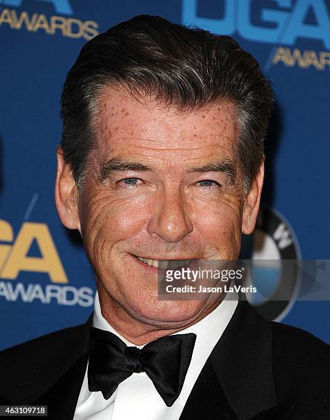 Actor Pierce Brosnan poses in the press room at the 67th annual Directors Guild of America Awards at the Hyatt Regency Century Plaza on February 7,...