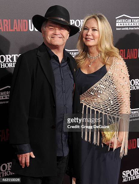 Actor/musician Micky Dolenz and Donna Quinter arrive at the World Premiere of Disney's "McFarland, USA" at the El Capitan Theatre on February 9, 2015...