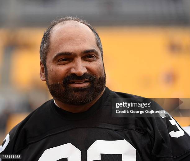 Franco Harris, former running back for the Pittsburgh Steelers, looks on from the sideline before a game between the New Orleans Saints and...